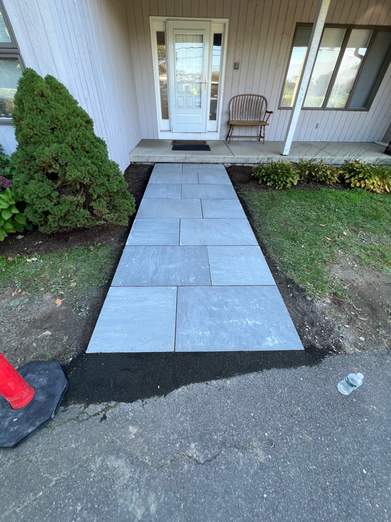 Bluestone entry walkway leading to a front door