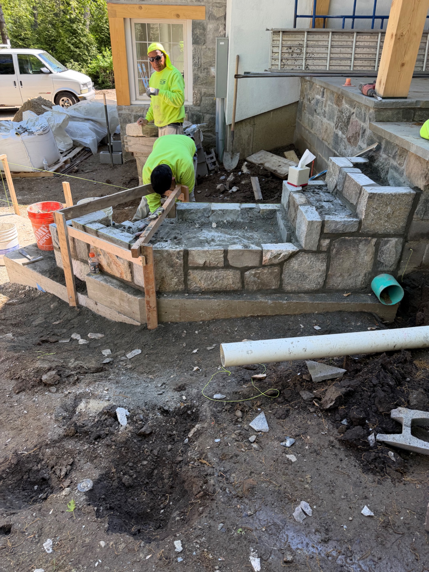 Natural stone wall and terrace under construction
